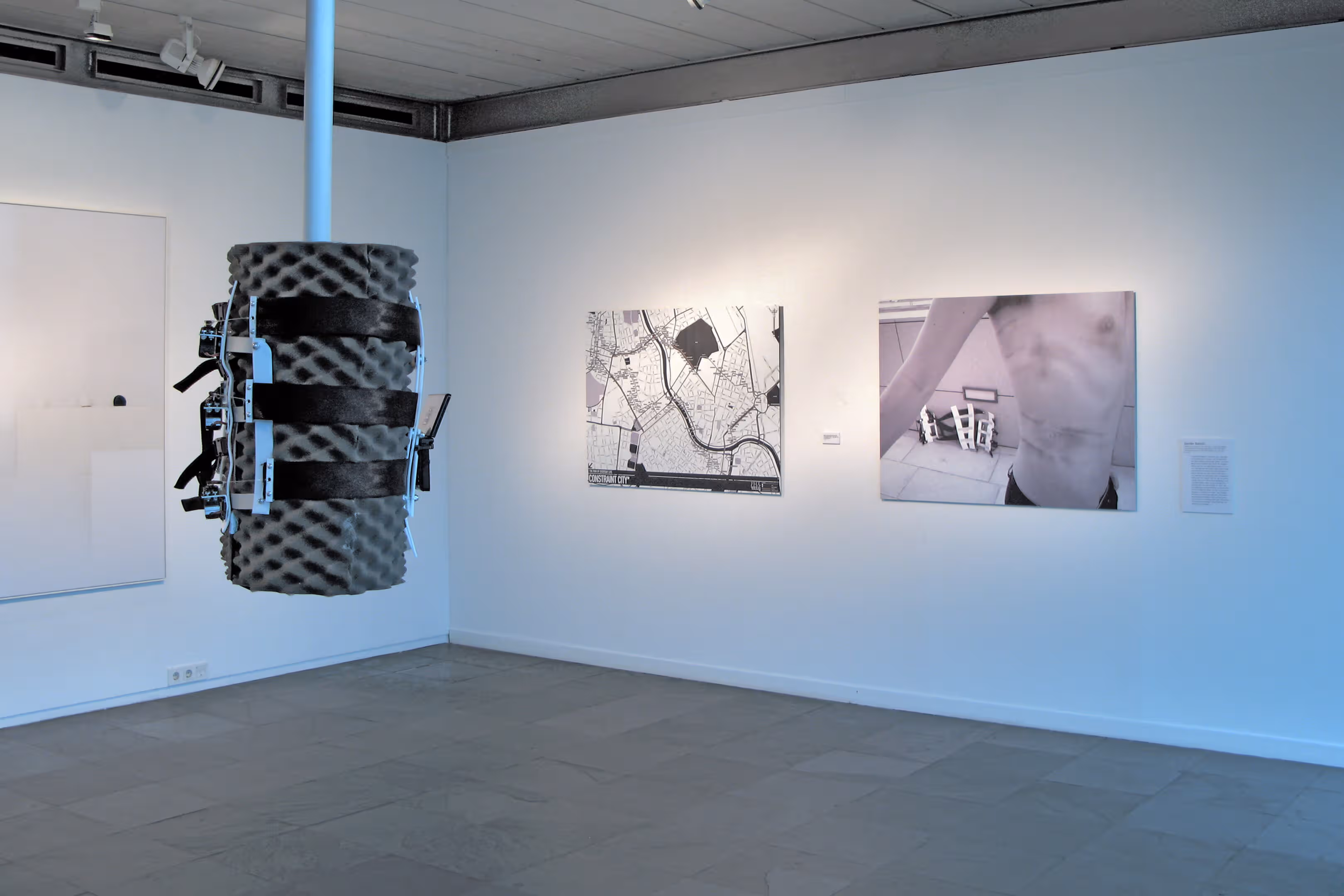 Exhibition view of Constraint City with map and corset at Kunsthalle Wien, 2007
