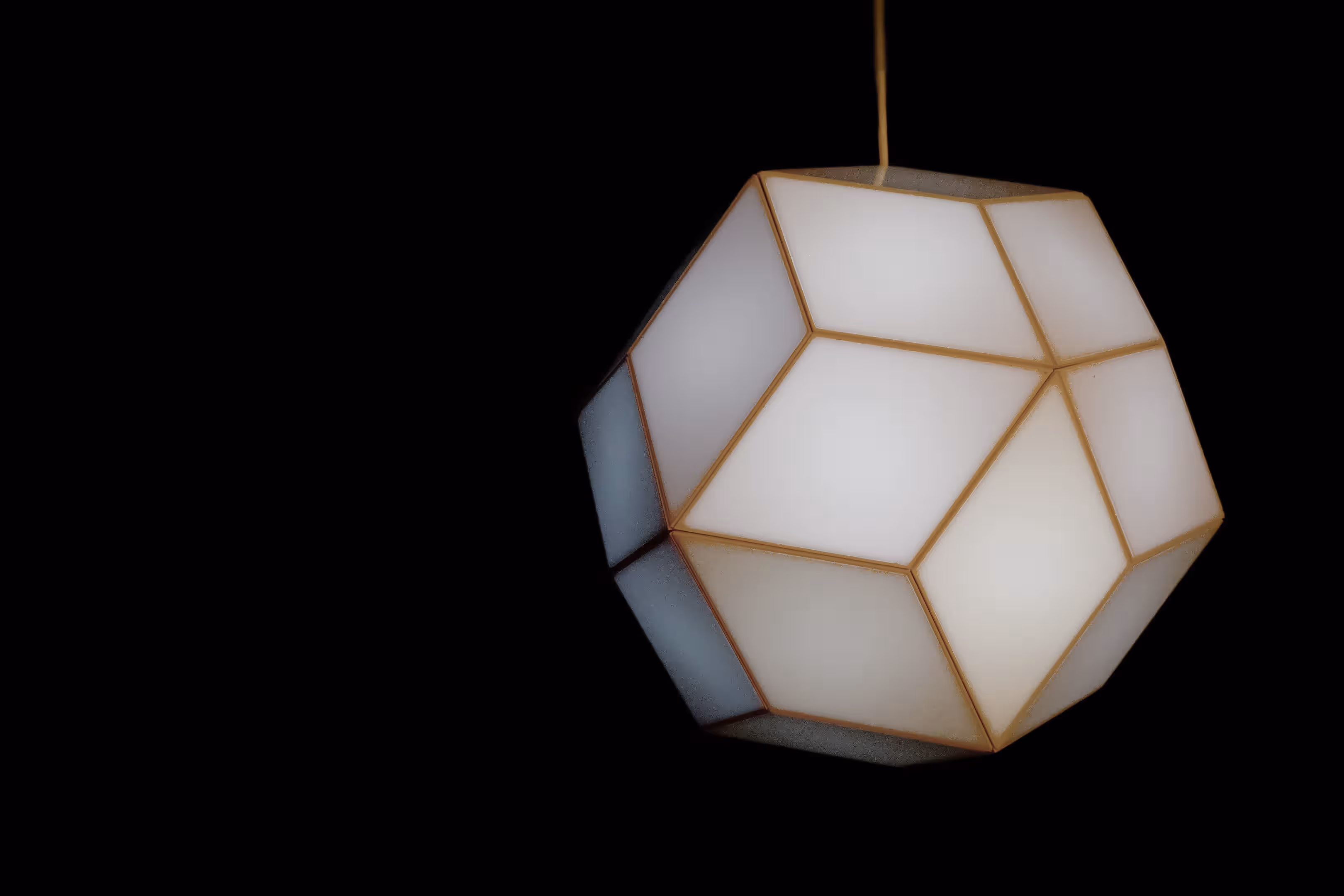 Diskohedron lamp all white in black room, Shortcuts Centre Pasquart, Bienne 2015