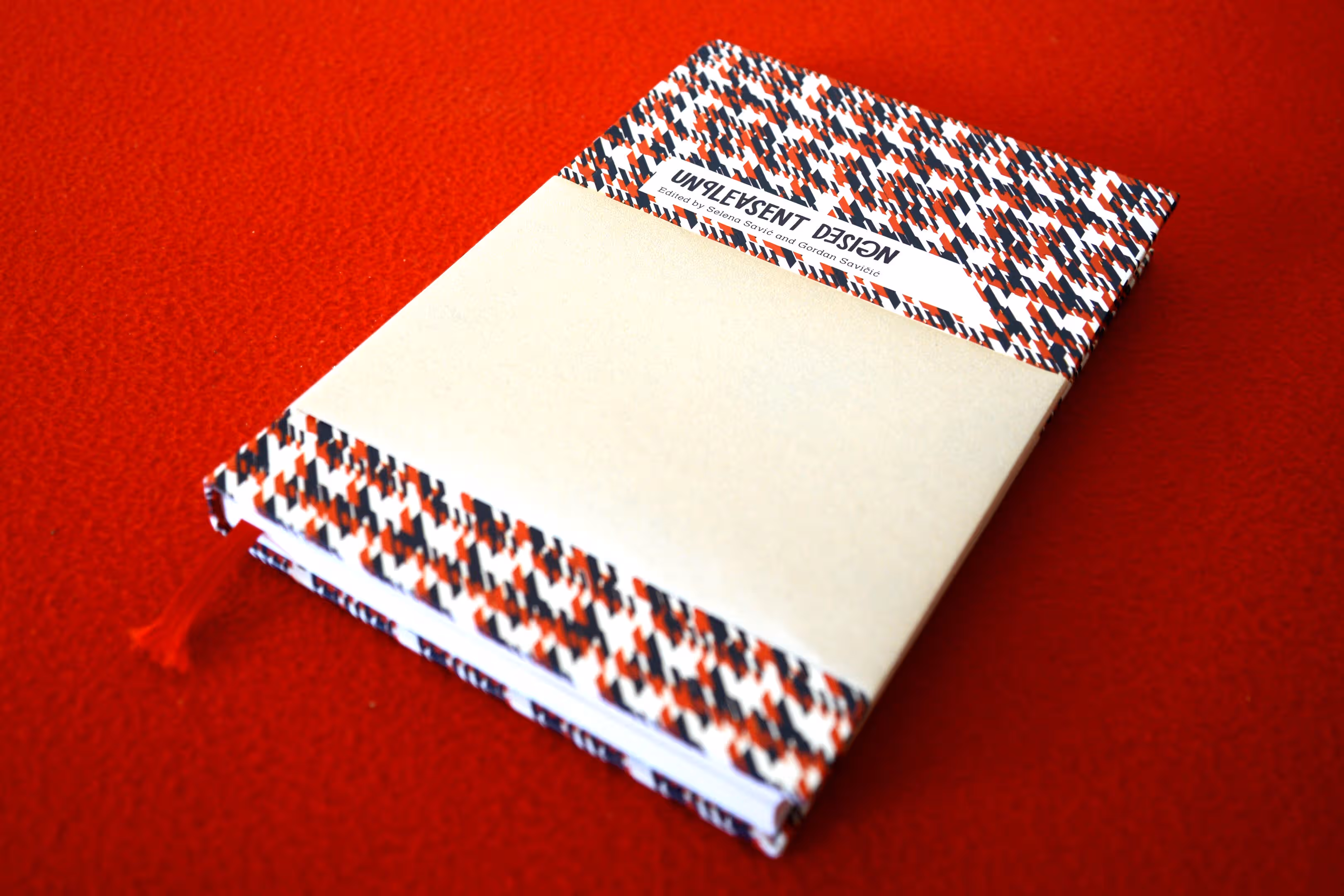 Close up of Unpleasant Design book cover with sandpaper wrap